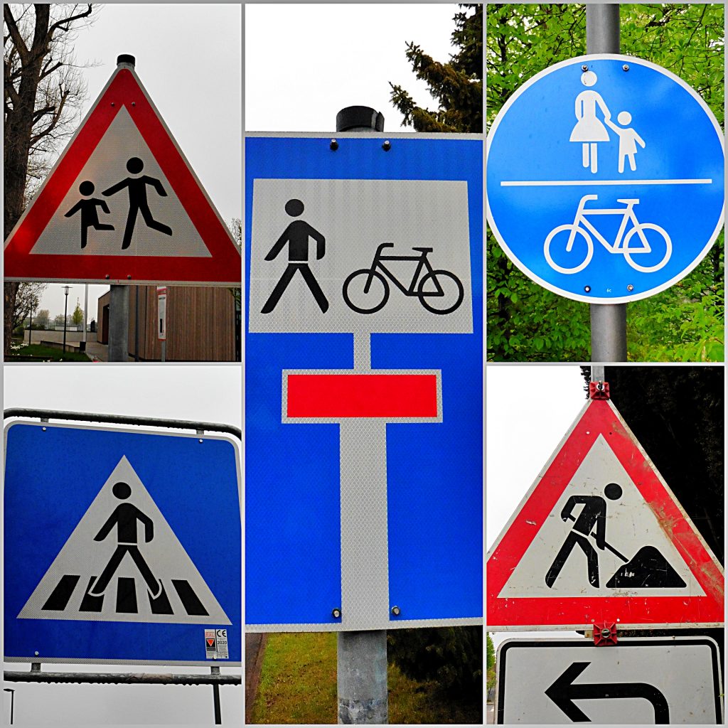 Der Mensch in Strassenschilder